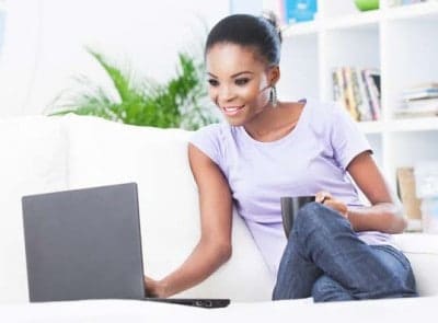 Black Woman Using a Laptop